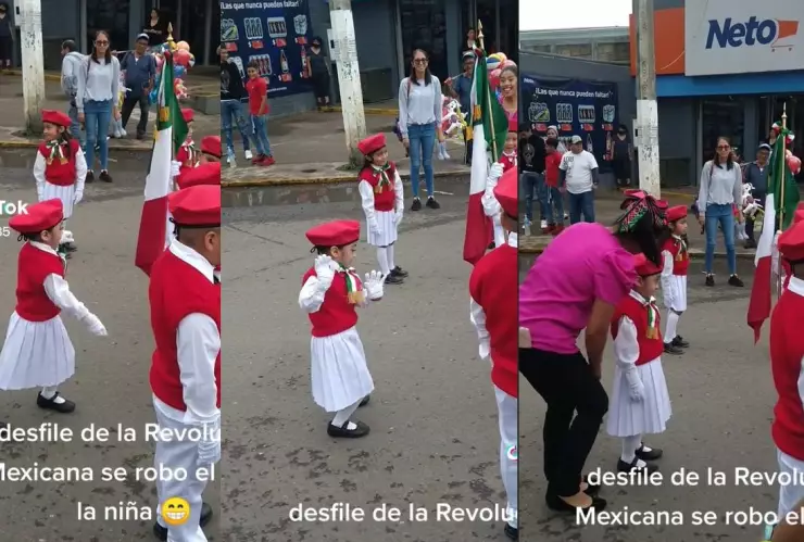 Niña baila en honores a la bandera.
