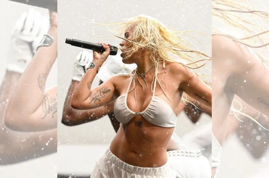 Karol G con sostén blanco.jpg
