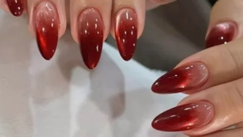 Uñas acento ojo de gato rojo