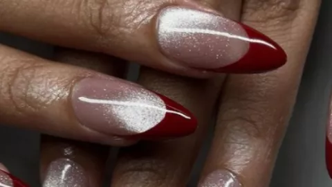 uñas francesas con ojo de gato rojo
