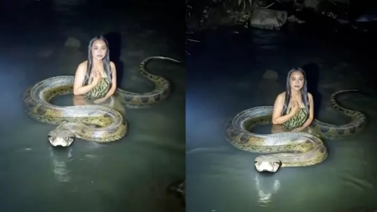 Mujer se baña con anaconda