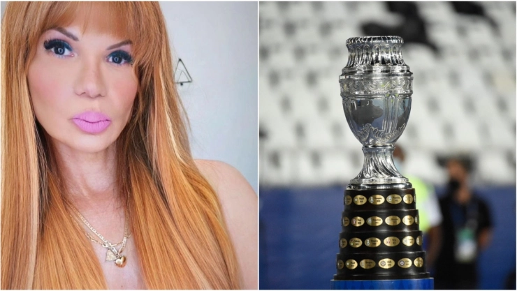 Mhoni Vidente junto al trofeo de la Copa América