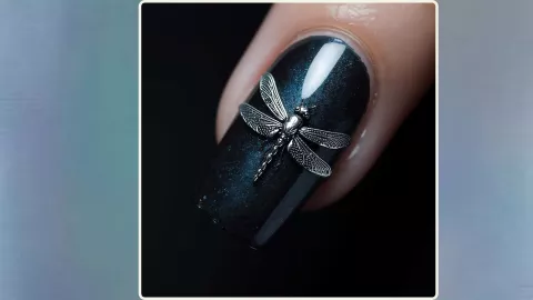 Uñas oscuras con libélulas metálicas