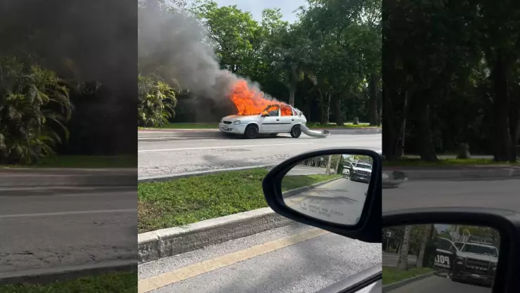 ¡Tráfico dominguero! Se incendia vehículo en zona hotelera de Cancún.jpg
