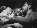Nodal y Beli durmiendo.jpg