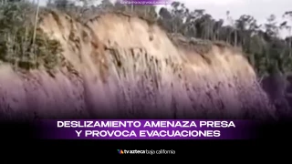 Deslizamiento amenaza presa.