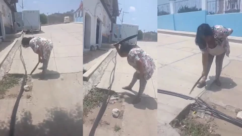 ¡Con machete en mano! Vecina corta mangueras y deja sin agua a comunidad en Oaxaca_ VIDEO.jpg