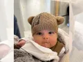 Inti con gorro, hija de Nodal y Cazzu.jpg