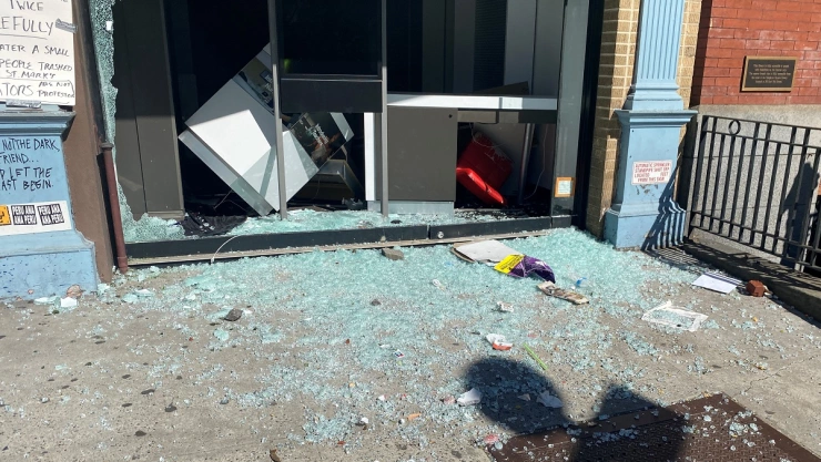 Business store windows are seen smashed along 2nd Avenue after protests the night before, during nationwide unrest following the death in Minneapolis police custody of George Floyd, in the East Village neighbourhood of Manhattan