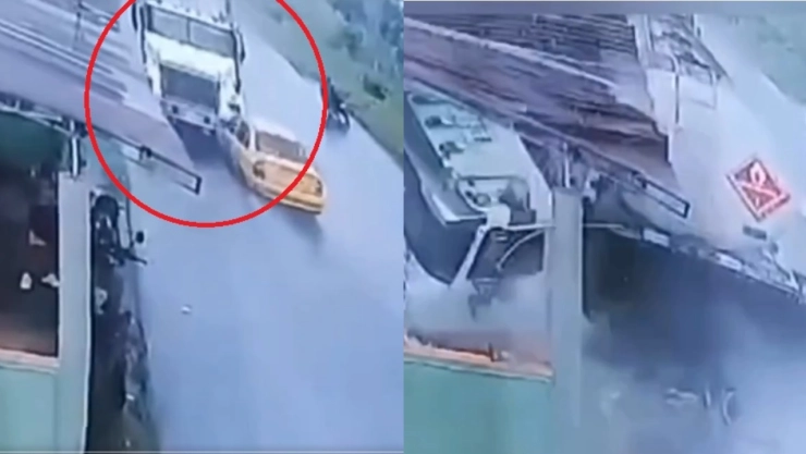 El accidente entre un camión y un taxi quedó grabado en video.