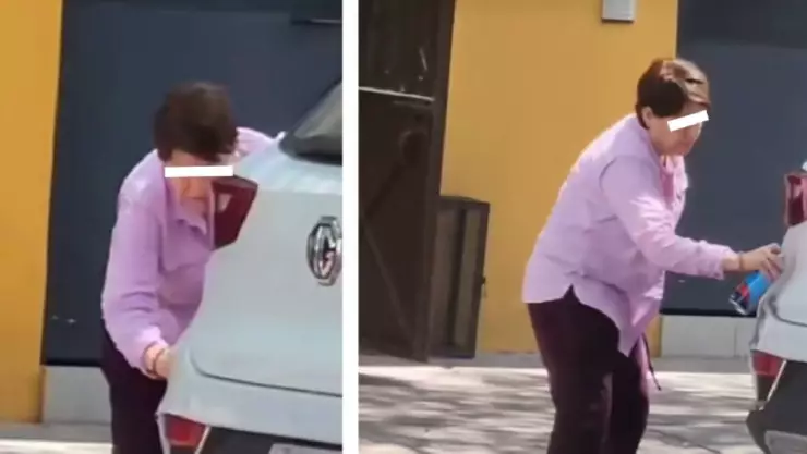 Mujer raya camioneta porque tapaba su entrada