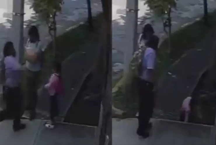 Hombre golpea y patea a niña en la calle.jpg