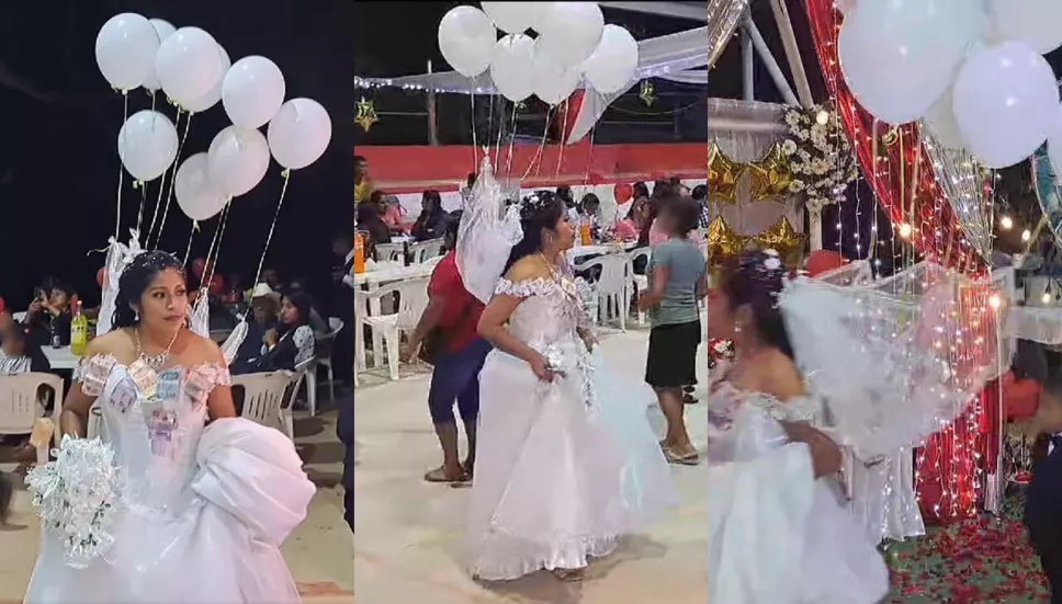 Novia luce globos en su velo