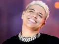 Eduin Caz sonriendo.jpg
