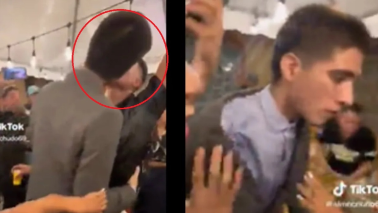 invitado besa a novio en plena boda