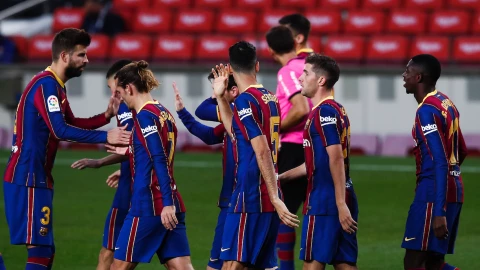 Fuerte discusi&oacute;n entre Piqu&eacute; y Griezmann en la Champions League