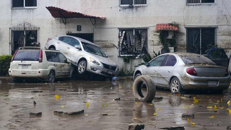 lluvias para febrero 2026, UNAM imagen de autos afectados por inundaciones en Poza Rica, Veracruz