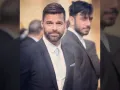 Ricky Martin y su pareja elegantes.jpg