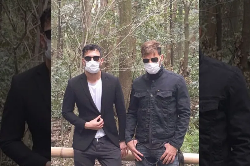 Ricky Martin y su pareja con lentes negros.jpg