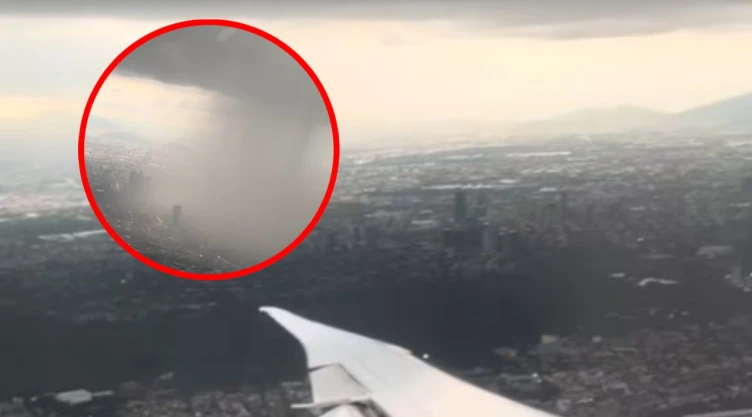 Graban caída de fuerte lluvia en CDMX desde un avión