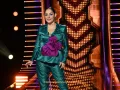 10 Lolita Cortés lució un bonito traje verde con una coleta.jpg