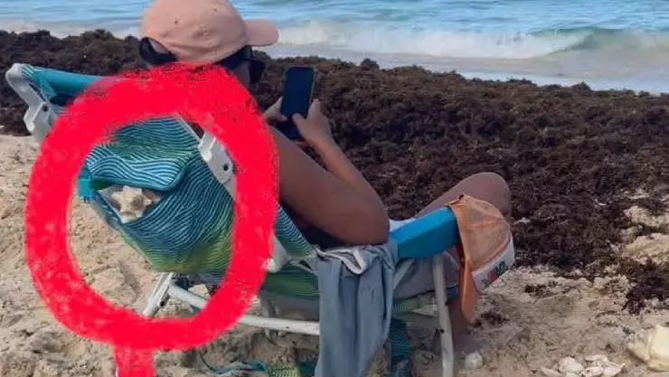 Denuncian a mujer por recolectar conchas con cangrejos vivos en Playa del Carmen; esto se sabe