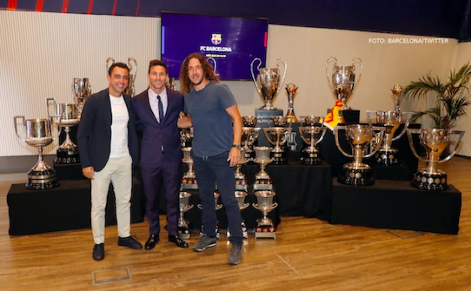 Puyol y Xavi con Messi .jpg