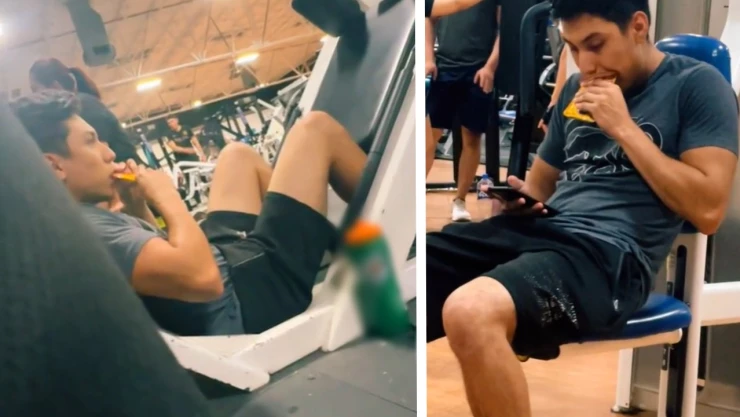 Joven come alimento para perro en gimnasio