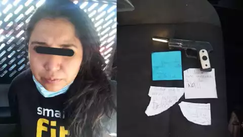 mujer asalta banco pistola juguete.jpg