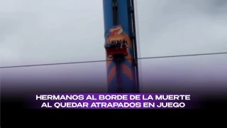 Hermanos quedan atrapados en juego de feria en Brasil.