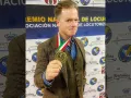 Gavito con una medalla.jpg