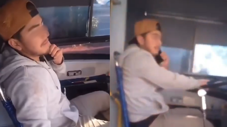 chofer de transporte público hablando por teléfono