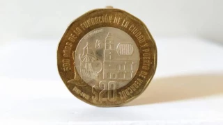 _Las 2 monedas conmemorativas de 20 pesos que se venden por 1 millón de pesos.png
