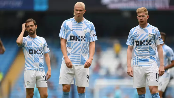Bernardo Silva, Erling Haaland y Kevin de Bruyne con el Manchester City