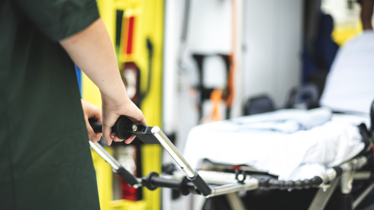 Paramedics at work with an ambulance