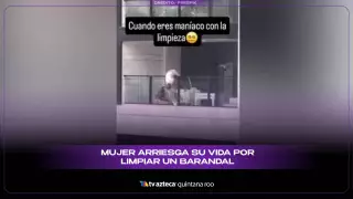¡A un resbalón caer en el precipicio! Mujer arriesga su vida por limpiar un barandal