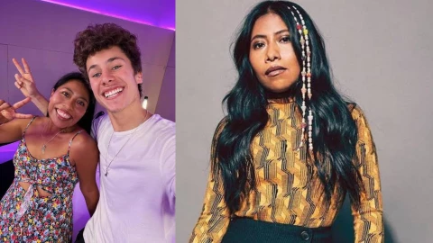 Yalitza Aparicio y Juanpa Zurita sonriendo a la cámara