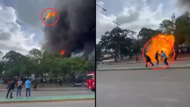 ¡Fuerte VIDEO! Fábrica explota, saca volando un barril en llamas, cae sobre un bombero y lo incendia en Venezuela