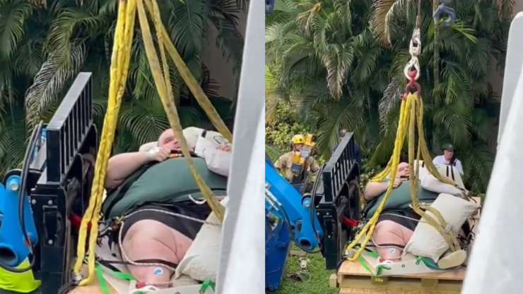 Hombre rescatada con grúa