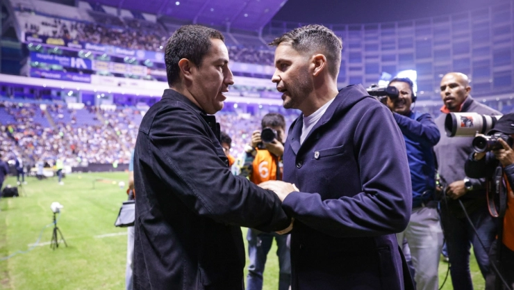Efraín Juárez y Nicolás Larcamón