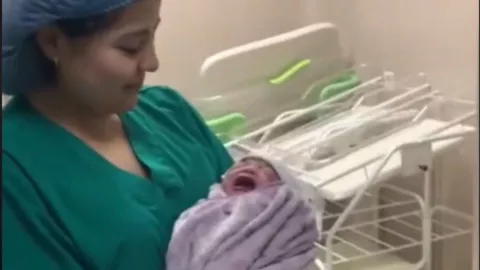 video de recien nacido que deja de llorar con bachata.jpg