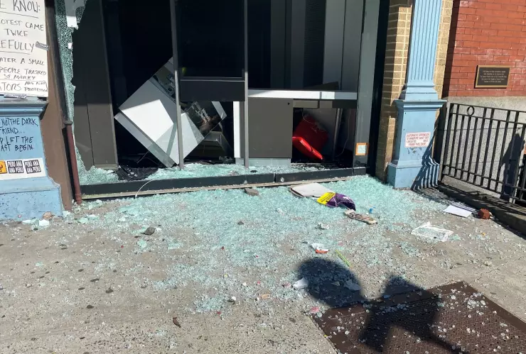 Business store windows are seen smashed along 2nd Avenue after protests the night before, during nationwide unrest following the death in Minneapolis police custody of George Floyd, in the East Village neighbourhood of Manhattan
