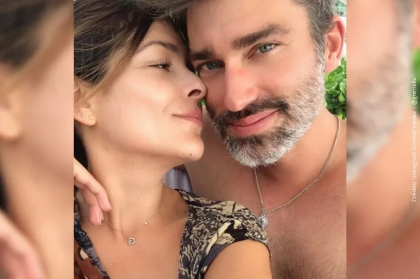 Grettell Valdez da un besito a su pareja..jpg