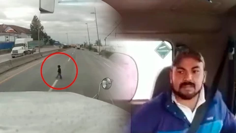 Hombre salva a niño en carretera