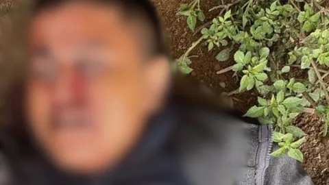Identifican cuerpo localizado en campos de San Miguel Canoa, Puebla; tenía huellas de violencia