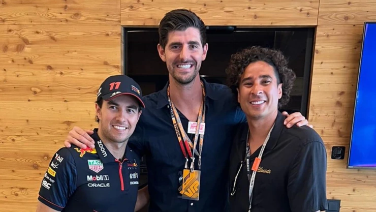 Guillermo Ochoa con Sergio Pérez y Thibaut Courtois en la F1