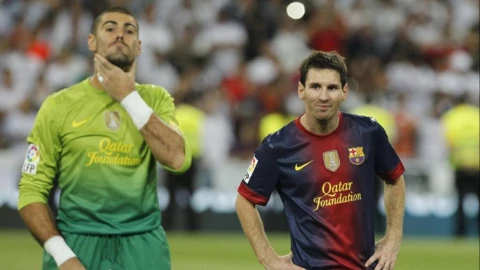 Víctor Valdes y Lionel Messi
