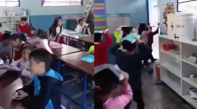 Maestro calma a niños por sismo en escuela de Guatemala