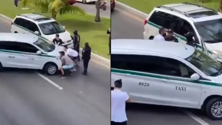 VIDEO: Ciudadanos intentan levantar taxi para abrir el paso