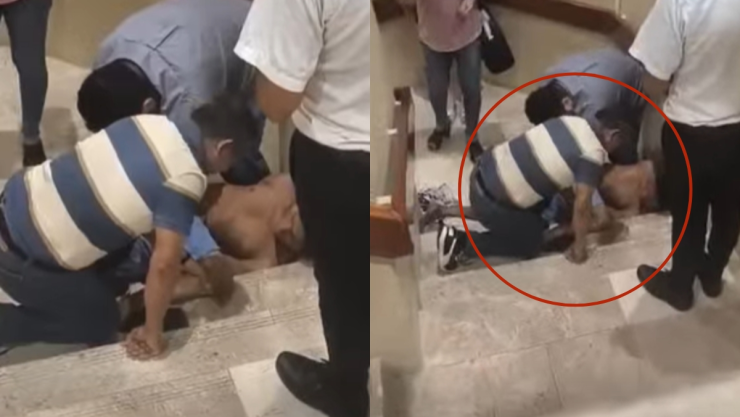 Encuentran a hombre grabando en baños de centro comercial